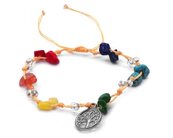 Handmade tied string pull tie anklet with rainbow colored chip stones, seed beads, and dangling silver metal tree of life charm in beige color.