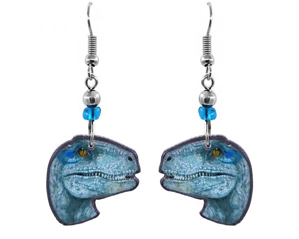 Handmade Velociraptor dinosaur face acrylic dangle earrings with beaded metal hooks in turquoise, light blue, white, and yellow color combination.