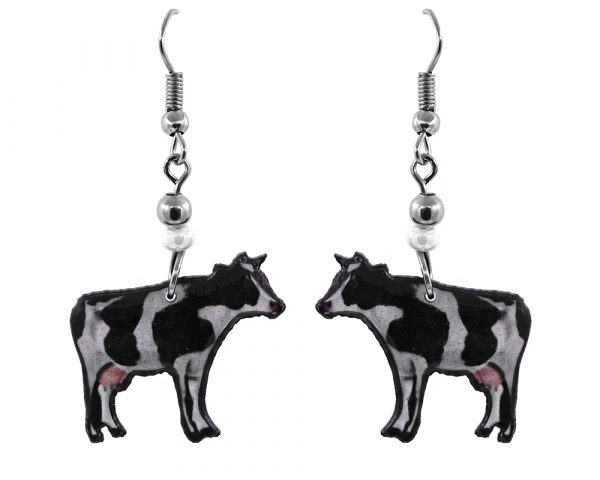 Handmade cow acrylic dangle earrings with beaded metal hooks in black, white, and light pink color combination.