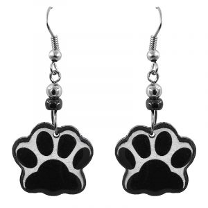 Handmade paw print acrylic dangle earrings with beaded metal hooks in black and white color combination.