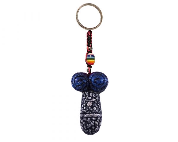 Handmade durepox resin figurine keychain of a yarn-like penis with an angry face and blue balls.