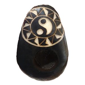 Handcarved tobacco smoking mini round natural tagua nut hand pipe bowl of a yin yang symbol inside of a tribal sun design.
