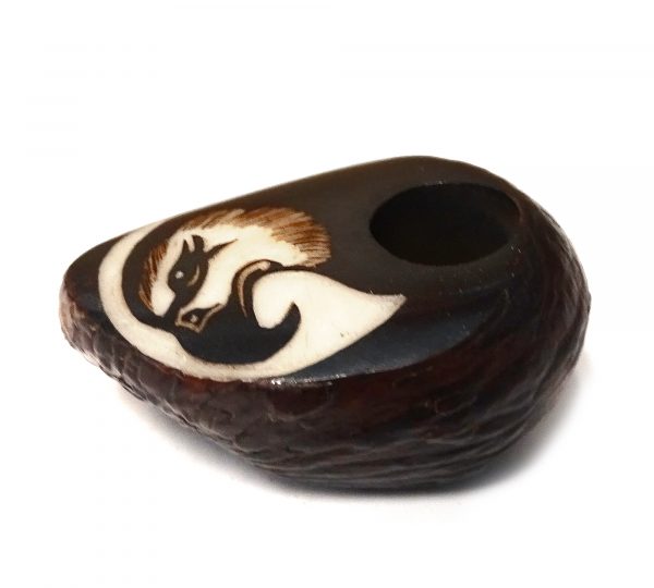 Handcarved tobacco smoking mini round natural tagua nut hand pipe bowl of an eagle head profile.