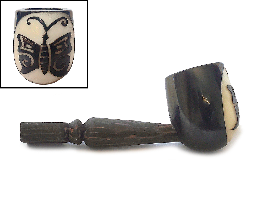Handcarved tobacco smoking natural tagua nut hand pipe of a butterfly in small size.