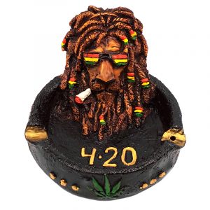 Handcrafted round incense holder ash tray with 3D figurine of a smoking lion with dreads and sunglasses in brown, black, and Rasta colors.