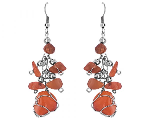 Handmade silver metal wire wrapped tumbled stone earrings with chip stone dangles in orange agate.
