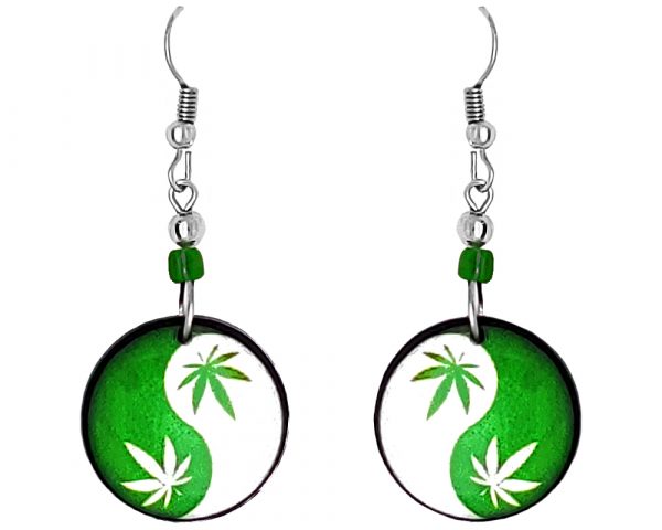 Handmade round-shaped yin yang with cannabis pot leaves graphic acrylic dangle earrings with beaded metal hooks in green and white color combination.