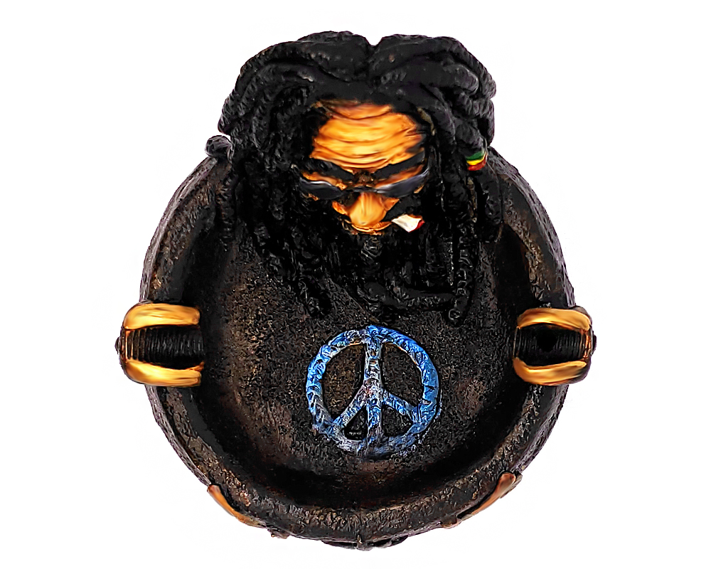 Handcrafted round incense holder ash tray with a peace sign and 3D figurine of a smoking man with dreads and sunglasses in black, brown, tan, gold, red, green, yellow, and white color combination.