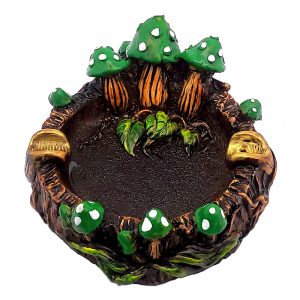 Handcrafted round incense holder ash tray with a 3D figurine of toadstool mushrooms and leaves in green, white, brown, black, and gold color combination.