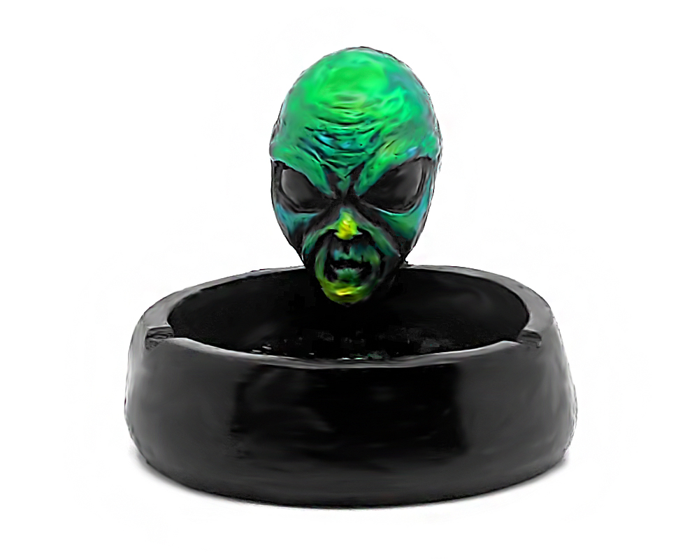 Handcrafted round incense holder ash tray with a galaxy design and a 3D figurine of an alien head in green, dark blue, white, and black color combination.