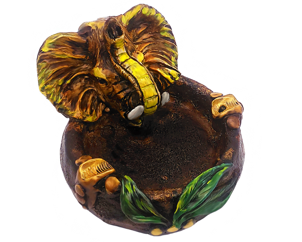 Handcrafted round incense holder ash tray with a leaf design and 3D figurine of an elephant head in yellow, beige, green, brown, black, and gold color combination.