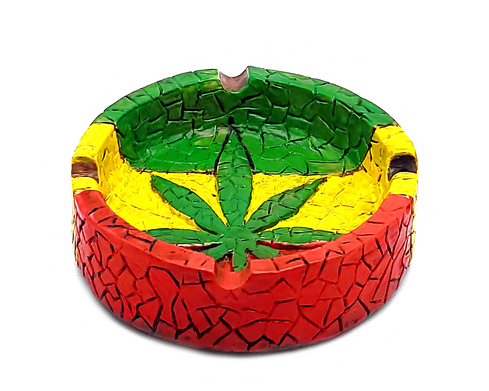 Handcrafted round-shaped flat incense holder ash tray with Rasta-colored mosaic tile design and cannabis pot leaf in green, yellow, and red color combination.