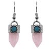 Handmade hexagonal-cut gemstone crystal point earrings with alpaca silver metal and mini round teal bead in light pink rose quartz.