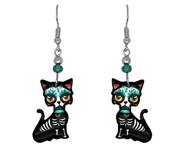 Day of the Dead sugar skull pattern cat acrylic dangle earrings with beaded metal hooks in black, white, teal, mint, red, and gold color combination.