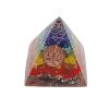 Handmade acrylic resin, copper wire, and crushed chip stone inlay orgonite pyramid table ornament with 7 chakra rainbow striped pattern and round copper metal tree of life charm.