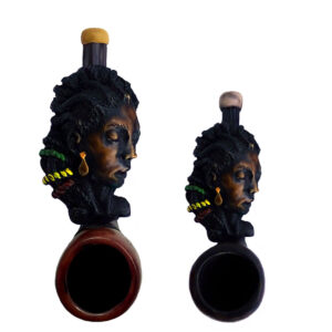 Handcrafted tobacco smoking hand pipe of a Rasta woman with dreads in both mini and small sizes.