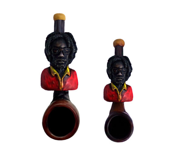 Handcrafted tobacco smoking hand pipe of a Rasta man with sunglasses and red and yellow shirt in both mini and small sizes.