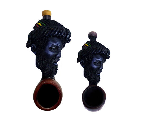 Handcrafted tobacco smoking hand pipe of a Rasta man with large dreads in both mini and small sizes.
