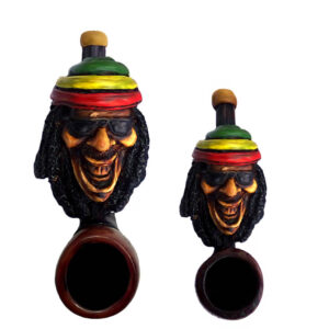 Handcrafted tobacco smoking hand pipe of a Rasta man wearing a hat and sunglasses in both mini and small sizes.