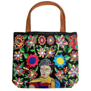 Handmade extra large tote purse bag with multicolored embroidered Frida inspired and floral designs and brown vegan leather suede handle in assorted colors. Color will vary from examples in image.