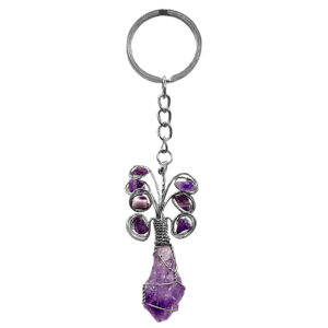 Handmade wire wrapped natural clear quartz crystal point keychain with silver metal peacock design and rainbow-colored chip stones on silver metal key ring.