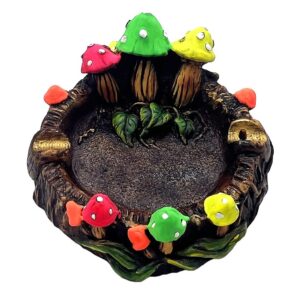 Handcrafted round incense holder ash tray with a 3D figurine of toadstool mushrooms and leaves in neon multicolored, white, brown, black, and gold color combination.