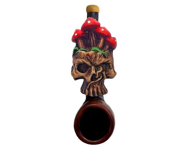 Handcrafted tobacco smoking hand pipe of a skull with red mushrooms in mini size.