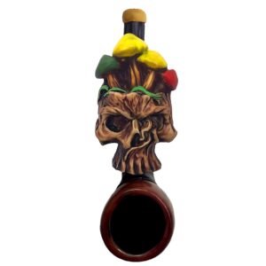 Handcrafted tobacco smoking hand pipe of a skull with Rasta colored mushrooms in mini size. Dimensions: 3.5" x 1.5" x 1" Weight: 1 oz.